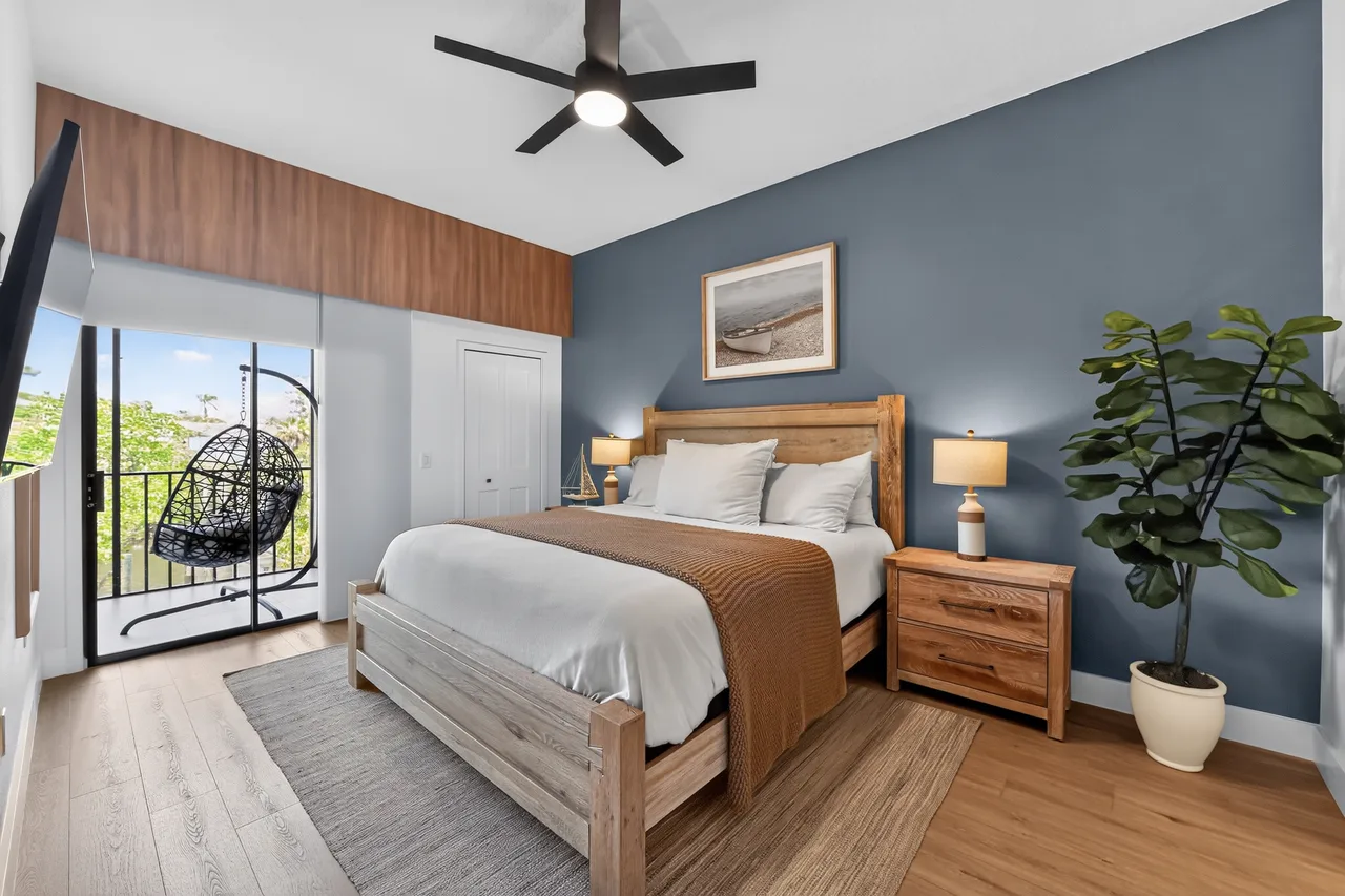 Virtually staged bedroom with furniture and decor added digitally to help buyers visualize the space
