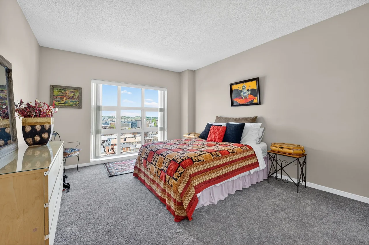 Professionally photographed bedroom showing the cinematic quality buyers expect from listing media