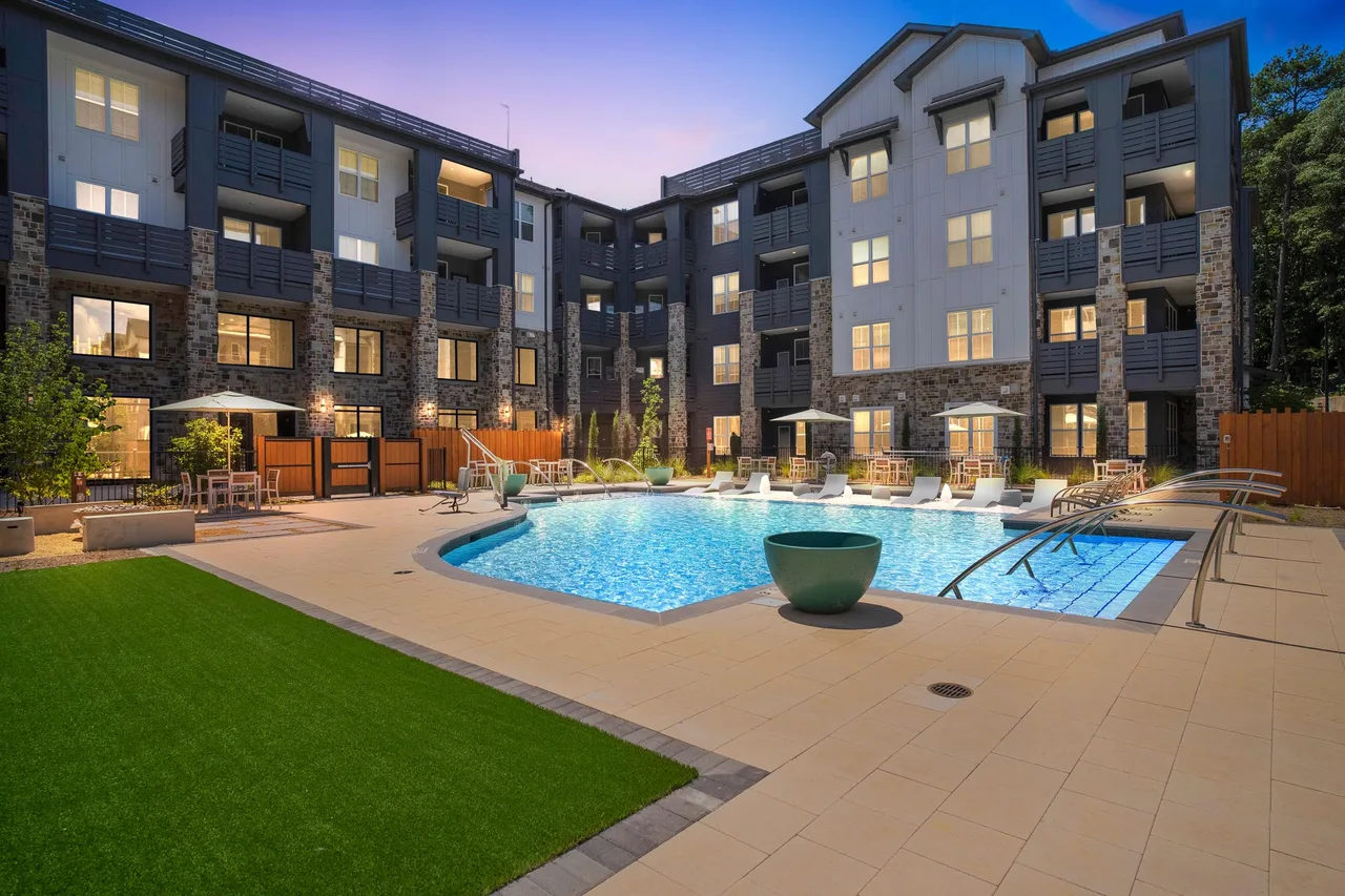 Apartment community pool at dusk